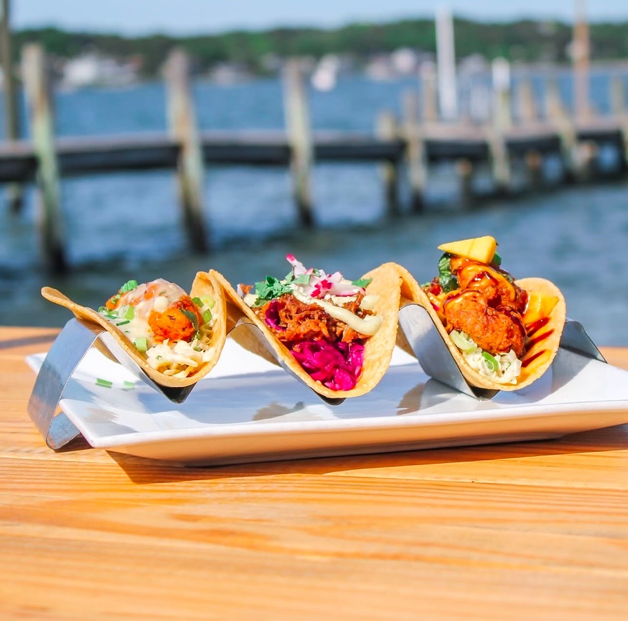 Which three tacos are calling your name? 🌮
Make your way to Taco Tuesday, then sit back and soak in the Hamptons’ best views, flavors, and deals! Three tacos for just $15 from 11am to 4pm—dine in or take them to go!
Right now, the staff’s top picks are:
🔥 BUFFALO SOLDIER TACO – Sriracha coconut chicken, Danish blue cheese, island slaw, green onions
🍤 SHRIMP TACO –Sage-breaded shrimp, island slaw, mango, sriracha aioli, eel sauce, green onions
🥑 RASTAMAN’S TACO – Panéed avocado, island slaw, corn salsa, rasta crema
Which trio will you choose? 🌮✨