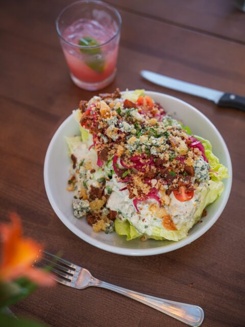 Lunch, but make it flavorful 😏
Say hello to The Blue Lagoon Wedge 🥗
Crisp Boston lettuce, juicy tomatoes, pickled red onions, sugared bacon, crouton crumbs, and Danish blue cheese…
It’s fresh, it’s satisfying, it’s got a little bit of everything.
Because a good salad should never be boring.
Perfect for a light lunch… or the start of something more. 🍹

#RumbaLunch #SaladButBetter #FreshFlavors #LunchPlans #EatGoodFeelGood